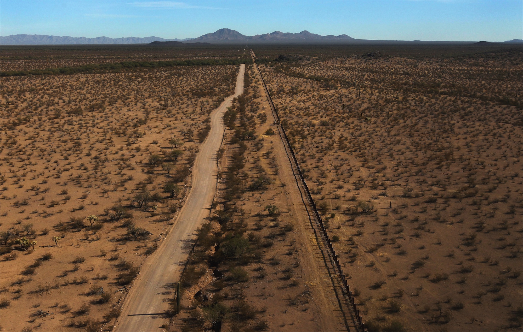 The U.S.-Mexico border fence through the Sonoran Desert, in the Tohono O’odham Reservation, Arizona. Getty Images